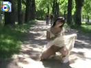 Hot teen slut flashing her pussy in a park