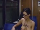 Naked girl taking the subway in name of art ()