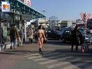 Hot chick crossing the street at some shops with no clothes on