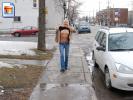 Skinny chick flashing her titties on the sidewalk!